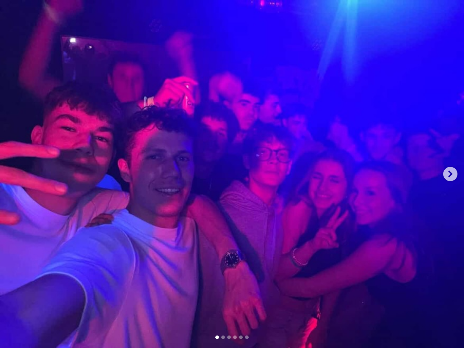 Crowd selfie blue lights